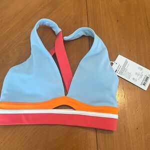 LSKD revitalise sports bra size xs in glacial blue/cayenne NWT